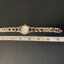 Relic BY FOSSIL-TWO TONE WATCH Beautiful gold and silver tone stainless steel watch with little diamond rhinestones, excellent condition, I have attached a video showing the watch works great. Photo 8