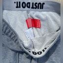 Nike Women’s  grey jogger sweatpants with pockets Photo 3