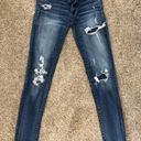 American Eagle Outfitters Ripped skinny jeans w patches Blue Size 0 Photo 0