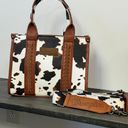 Wrangler ALLOVER COW PRINT CROSS BODY MINI TOTE IN BLACK/WHITE Photo 1