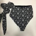 dippin daisy's swimwear Dippin’ Daisy’s Grace High Waisted Side Tie Black Floral Bikini Swim Bottoms Photo 6