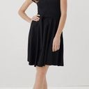 Petal Pact • Black Fit & Flare  Sleeve Dress Photo 0