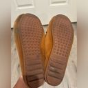 Minnetonka  Women’s Thunderbird II Brown Leather Moccasin size 9.5 Photo 2