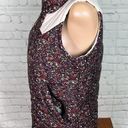 Nike  6.0 floral puffer vest. Like new. Small. florals w/cream accents EUC Photo 4