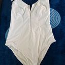 One Piece White Swim Suit Photo 0