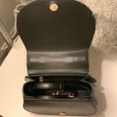 Charles and Keith Charles Keith Black Saddle Bag With Gold Chain Detail Photo 3