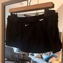 Nike  Swim Shorts Size 10 Versatile Black Shorts with Adjustable Waist Photo 1