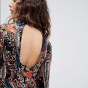 Free People  All Dolled up paisley printed open back mini black dress size S Photo 4