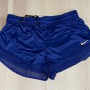 Nike  Women’s Royal Blue Running Shorts with Gold Glittery Swoosh Size L #616-10 Photo 4