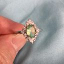 Sterling Silver Light green quartz and clear crystals ring. Size 8.  setting. Photo 1