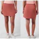 Athleta  Run With It 14 Inch Skort with Jupe Short in Coral Size Large Photo 1