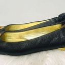 Juicy Couture  black flats with gold symbol sz 9.5 Photo 0