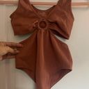 One Piece NWOT Sugar Rain  body suit. size S/M. never Worn before Photo 2