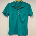 Nike Women’s  golf turquoise polo Photo 0