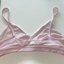 Alo Yoga AloSoft Sports Bra in light pink  Photo 3