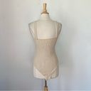 Aura Ribbed Solid Beige V-Neck Fitted Sleeveless Bodysuit Photo 3