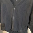 Reebok  Womens Bomber light black jacket - size medium Photo 1