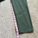 Gaiam Olive Green Leggings With Dual Pockets and Mesh Detailing Around Calves Photo 5