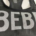 Bebe  | Racerback Sports Bra Black Chest Logo Removable Pads Moisture Wick Sz S Photo 1