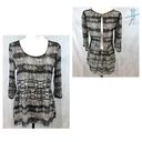 Charming Charlie Black and white long sleeve abstract print backless peplum top size small Photo 1