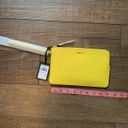 DKNY NWT  Donna Karan Lemon Yellow Wristlet Leather *Sold Out*. Photo 1