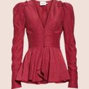 Rebellion Aje  Tucked Peplum V-Neck Long Sleeve Corset Top in Magenta Photo 10