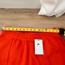 Nike swoosh red/orange sweatpants Photo 2