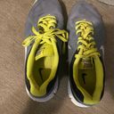 Nike  women's  Revolution Grey/Yellow Running Shoes. 9 Photo 7