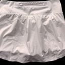 Athleta  WHITE RUN WITH IT TENNIS SKORT (S) Photo 5