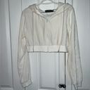 Pretty Little Thing NWT  cream velour crop sweatshirt. Photo 2