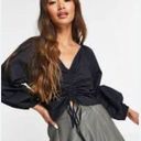 CeCe  Ruffle Mango ruched front blouse in black Photo 1