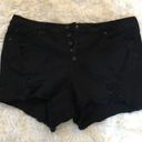 Torrid  BLACK DISTRESSED BUTTON FLY SHORTIES Photo 0