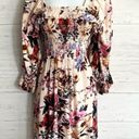 Angie  Floral Smocked Ruffle Dress Photo 1