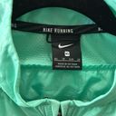 Nike  Running Puffer Vest Size XS Vibrant Mint Green Photo 2