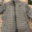 The North Face  Grey Puffy Jacket  Photo 0