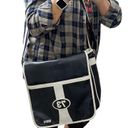 Roots  Black with White Piping Flap Messenger Crossbody - Medium Size Photo 1