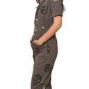 Fantastic Fawn  Skull and Star Short Sleeve Jumpsuit in Dark Green Photo 1