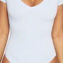 Naked Wardrobe  blue v-neck short sleeve bodysuit Photo 0