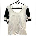 Lululemon  BLACK AND CREAM MESH SLEEVE JERSEY STYLE TOP Photo 0