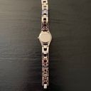 Relic BY FOSSIL-TWO TONE WATCH Beautiful gold and silver tone stainless steel watch with little diamond rhinestones, excellent condition, I have attached a video showing the watch works great. Photo 7