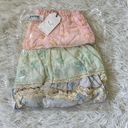 Free The Roses  Color Block Eyelet Trim Detail Mini Skirt Women’s size Medium Photo 1