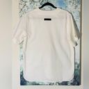 Fear of god Essentials Women's Boy Scout Shirt size L Photo 2