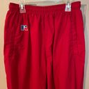 Russell Athletic Russell women’s vintage red lined nylon track pants w/pocket zip ankles. Size L Photo 2