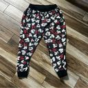 Disney  Mickey and Minnie faded black sweatpants Photo 1