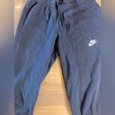 Nike  sportswear club fleece, women’s mid-rise joggers. Photo 1