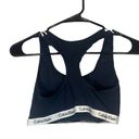 Calvin Klein  Black & White Striped Logo Trim Racerback Sports Bra Women Sz M Photo 1