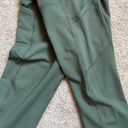 Gaiam Olive Green Leggings With Dual Pockets and Mesh Detailing Around Calves Photo 8