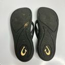 Olukai  black flip flops women’s size 7 Photo 6