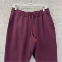 Lululemon  On the Fly Jogger Woven Cassis Maroon Red Women's 8 x 28 Photo 1