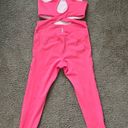 Free People Movement FP Movement “back it up” onesie in the dragonfruit color Photo 2